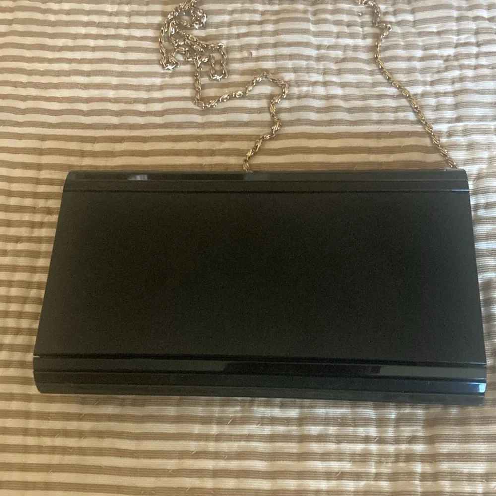 Vintage black plastic clutch